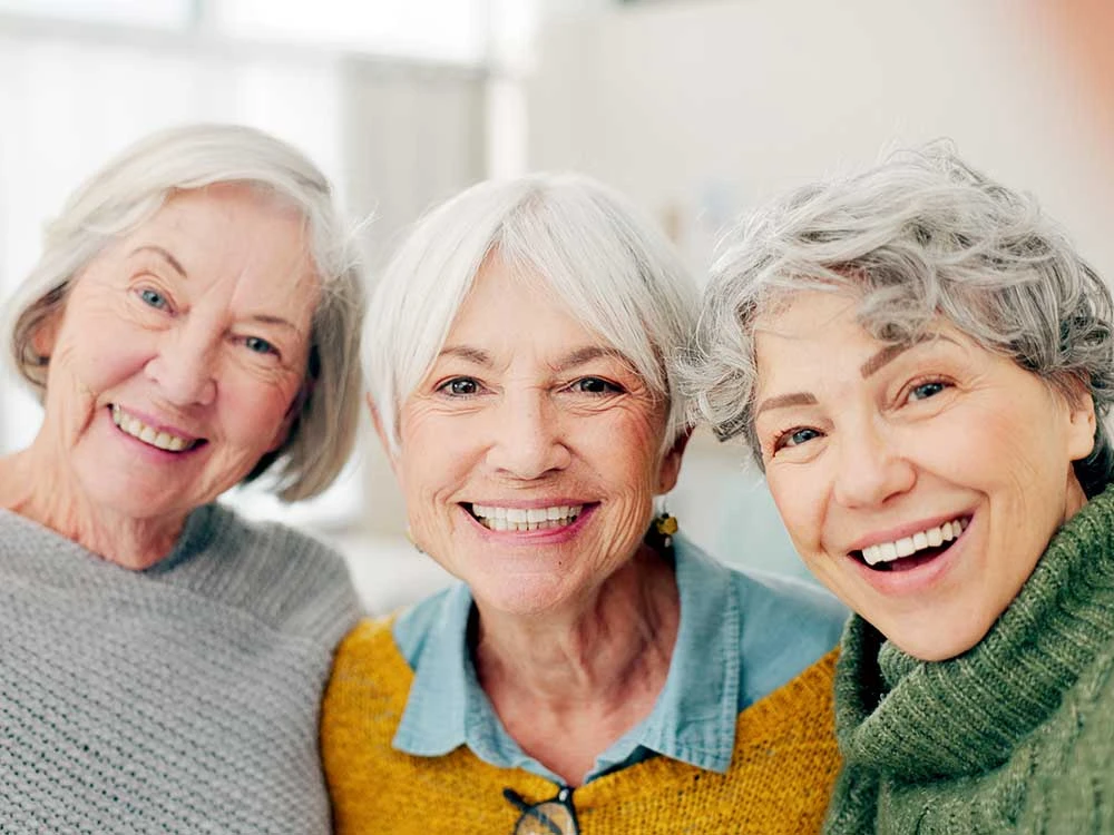 3 senior women standing together